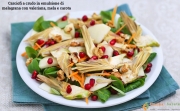 Carciofi a crudo in emulsione di melagrana con valeriana, mela e carota